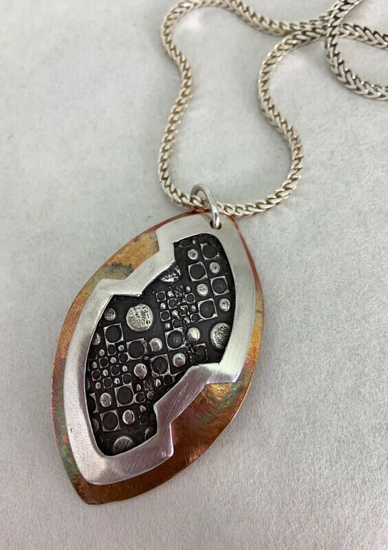 sterling silver and copper pendant